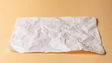 Fototapeta na wymiar Crumpled white paper background.
