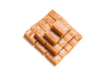 Tasty caramel candy isolated on white background.