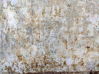 Corroded metal background. Rusty metal background with streaks of rust. Rust stains. Rystycorrosion.