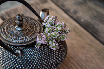Obraz na płótnie Canvas tea pot with thyme