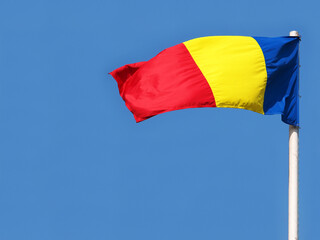 Romanian flag on the flagpole
