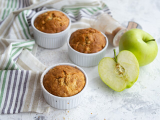 Muffin with cheese and apple. Fresh homemade cakes. Maasdam. Concept of healthy breakfast. Close up. Copy space.