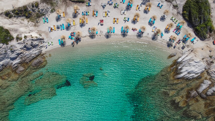 Mediterranean Greek landscape drone shot at Kavourotripes beach with bathers. Sithonia Chalkidiki...