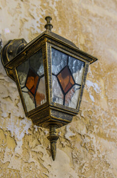 Old street lamp on the wall