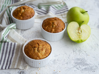 Muffin with cheese and apple. Fresh homemade cakes. Maasdam. Concept of healthy breakfast. Close up. Copy space.