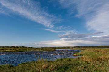 Summer sky over the Velikaya river, Pskov region, Russia