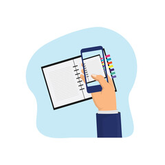 Photo of notebook using a smartphone, working moments