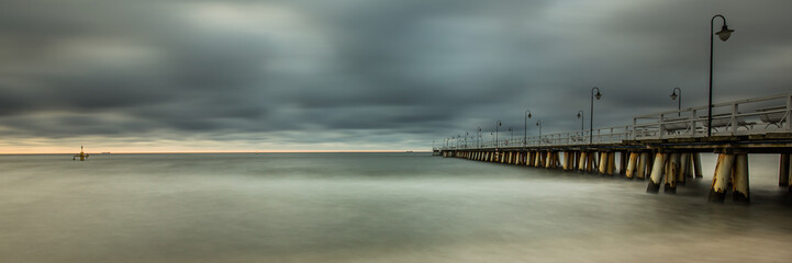 Fototapeta na wymiar stormy sunrise over the baltic sea in Gdynia Orlowo, Poland 