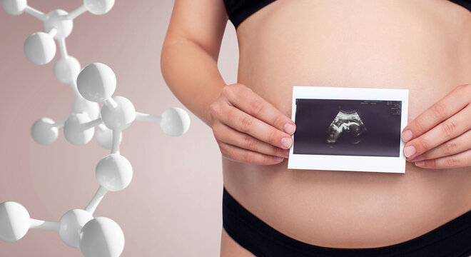 Pregnant woman holds ultrasound picture among molecules chain. Concept of genetic science.