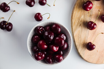 Close-up of a cherry tree on a wooden Board. Fresh berries