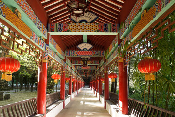 Fototapeta na wymiar This colorfully decorated corridor is just one of the many attractions of Qiongzhu Si (Bamboo Temple) in Kunming, China; it dates back to the Tang Dynasty.