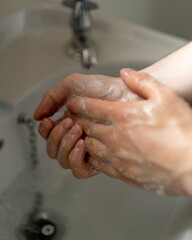 washing hands with soap