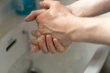 Fototapeta premium hand washing foam soap coronavirus