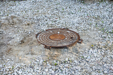 Installation of sewer manholes and landscaping around