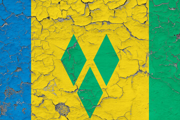 Saint Vincent And The Grenadines flag close up grungy, damaged and weathered on wall peeling off...
