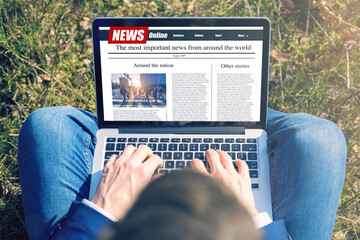 Work outside concept. Men reading news on a computer screen. Mockup website. Newspaper and portal...