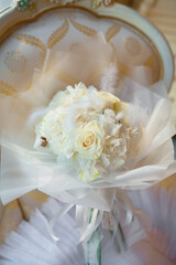 beautiful white bouquet of delicate natural flowers of roses