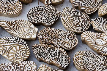 Carved wood henna stamps for sale in market, Ahmedabad, Gujarat, India