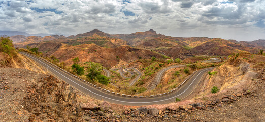 winding road in Semien, Simien Mountains National Park landscape in Northern Ethiopia. Africa countryside wilderness, Sunny day with blue sky