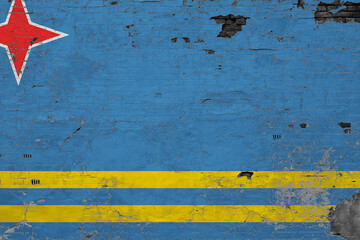 Aruba flag on grunge scratched concrete surface. National vintage background. Retro wall concept.
