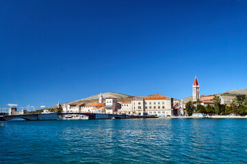 Fototapeta na wymiar View of the stone bridge and historic buildings of the city of Trogir in Croatia.