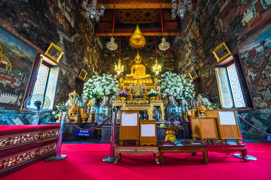Golden Buddha Statue in the Temple of Dawn (Wat Arun) Interior, in Bangkok, Thailand