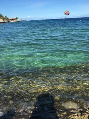 mactan cebu beach clear waters philippines parasailing parachute