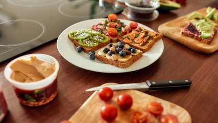 Set with toast bread and different healthy vegetarian toppings. Vegetarianism, healthy food concept