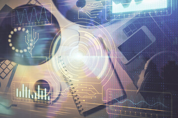 Multi exposure of stock market chart drawing and office interior background. Concept of financial analysis.