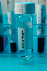 Laboratory tube with Dexamethasone inside, (covid-19 coronavirus cure), with bottom test tubes