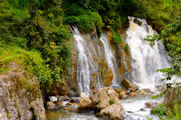 Fototapeta na wymiar It's Waterfall in a village of Catcat, Vietnam