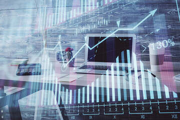 Double exposure of financial graph drawing and office interior background. Concept of stock market.