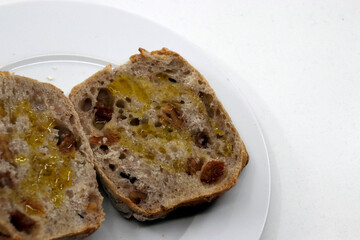 Two slices of bread with olive oil