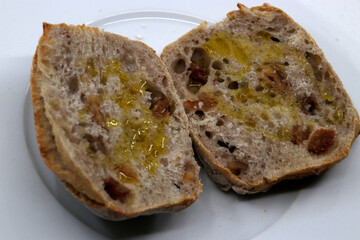 Two slices of bread with olive oil