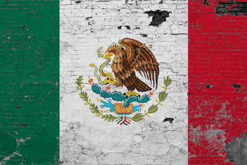 Mexico flag on grunge scratched concrete surface. National vintage background. Retro wall concept.