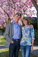 Naklejka premium Happy friendly attractive senior couple outdoors.