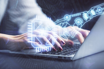 Multi exposure of woman hands working on computer and data theme hologram drawing. Tech concept.