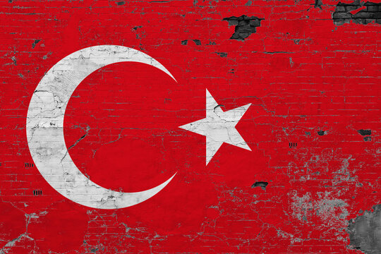 Turkey flag on grunge scratched concrete surface. National vintage background. Retro wall concept.