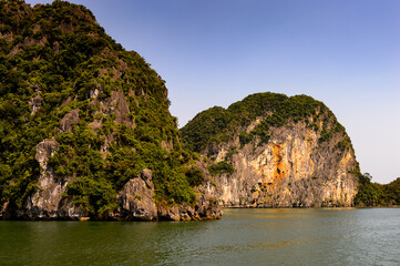 Fototapeta na wymiar It's Ha Long bay islands in the Indochina sea. UNESCO World Heritage site