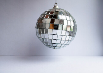 Christmas composition. Christmas wooden decorations and tinsel on a blue  background. Flat layout, top view, space for text.