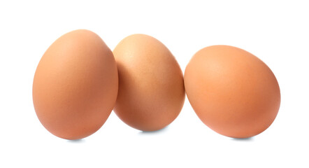 Fresh chicken eggs on white background