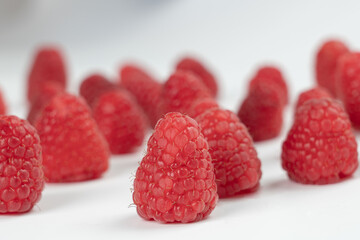 Raspberry fruits on a white background
