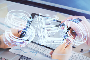 Multi exposure of man's hands holding and using a digital device and seo drawing. search...