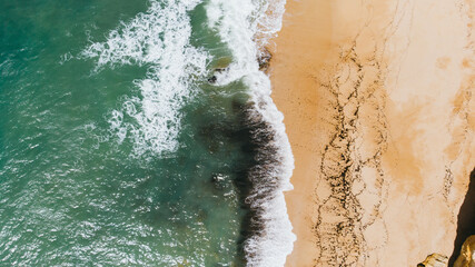 Aerial view of beach ocean waves and sand on Gold Coast beach