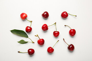 Obraz na płótnie Canvas Tasty sweet cherry on white background