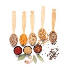 Spoons with lentils and spices on white background