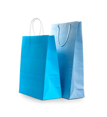 Paper shopping bags on white background