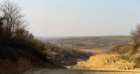 Construction of a new way. The road service repairs the highway.