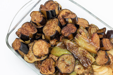 Turkish Food Fried, Aubergine or Eggplant Slices and potatoes on the glass plate.
