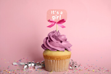 Baby shower cupcake for girl on pink background